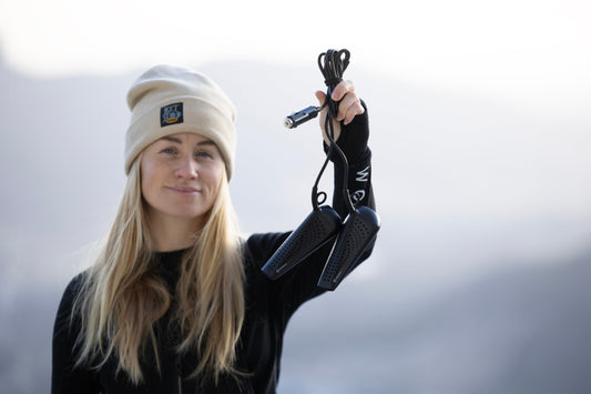 Woman holding Hedgehog DRIVE travel dryer